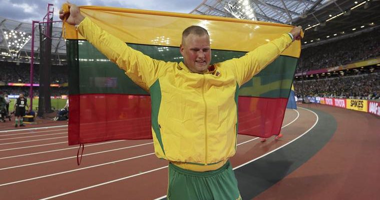 Lithuania's Andrius Gudzius celebrates after winning the Men's Discus Throw final during the World Athletics Championships in London Saturday, Aug. 5, 2017. (AP Photo/Tim Ireland)
